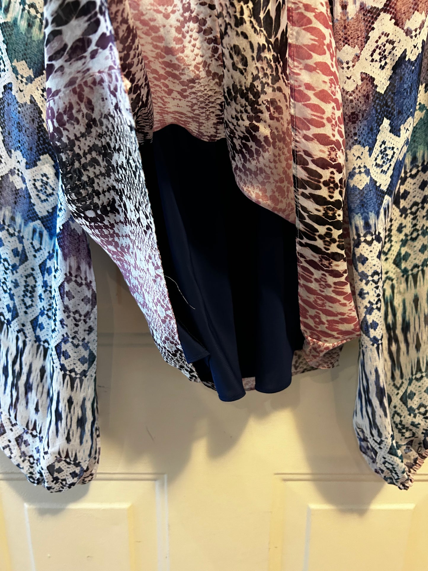 Ramy Brook Kayden mixed-print silk blouse with a drawstring tie neckline